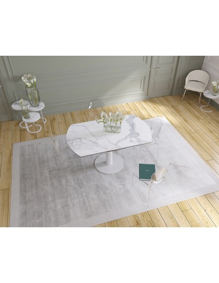 UNA - Table de repas extensible deux allonges intégrées pied central acier laqué blanc