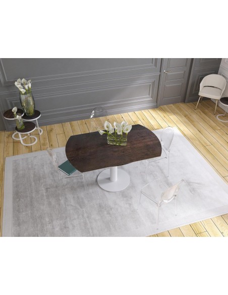 UNA - Table de repas extensible deux allonges intégrées pied central acier laqué blanc